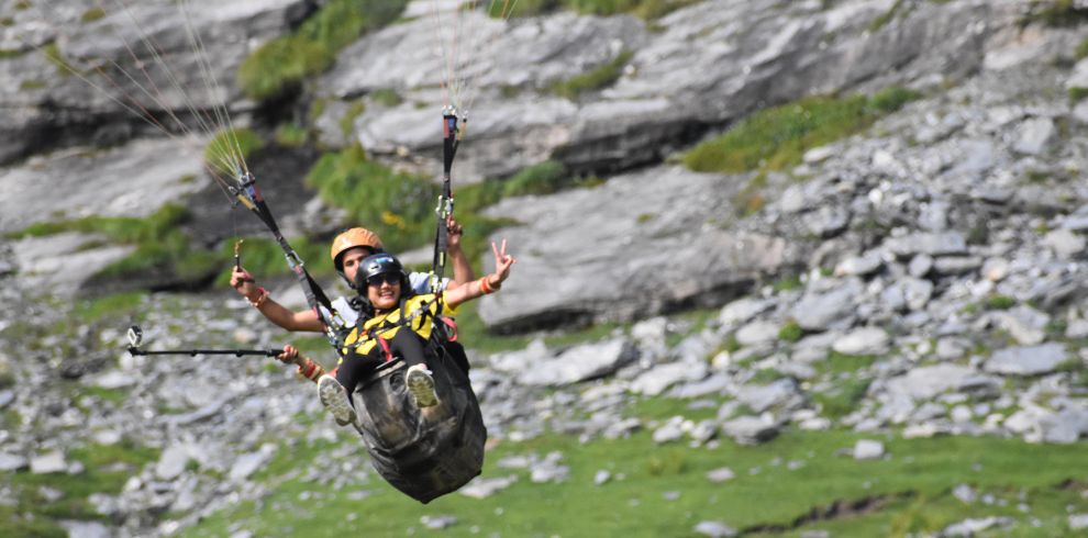 Woman paragliding ride in Manali