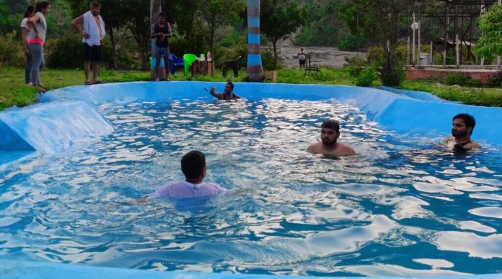 swimming pool at the palmview resort