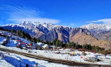 View of snow covered mountains from Auli